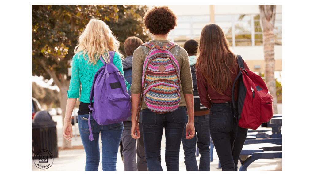 “Group of Calgary students walking toward school with backpacks during back-to-school season.”